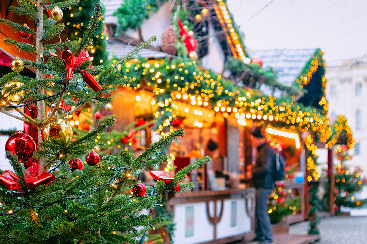 People visiting stalls at a Christmas Market
