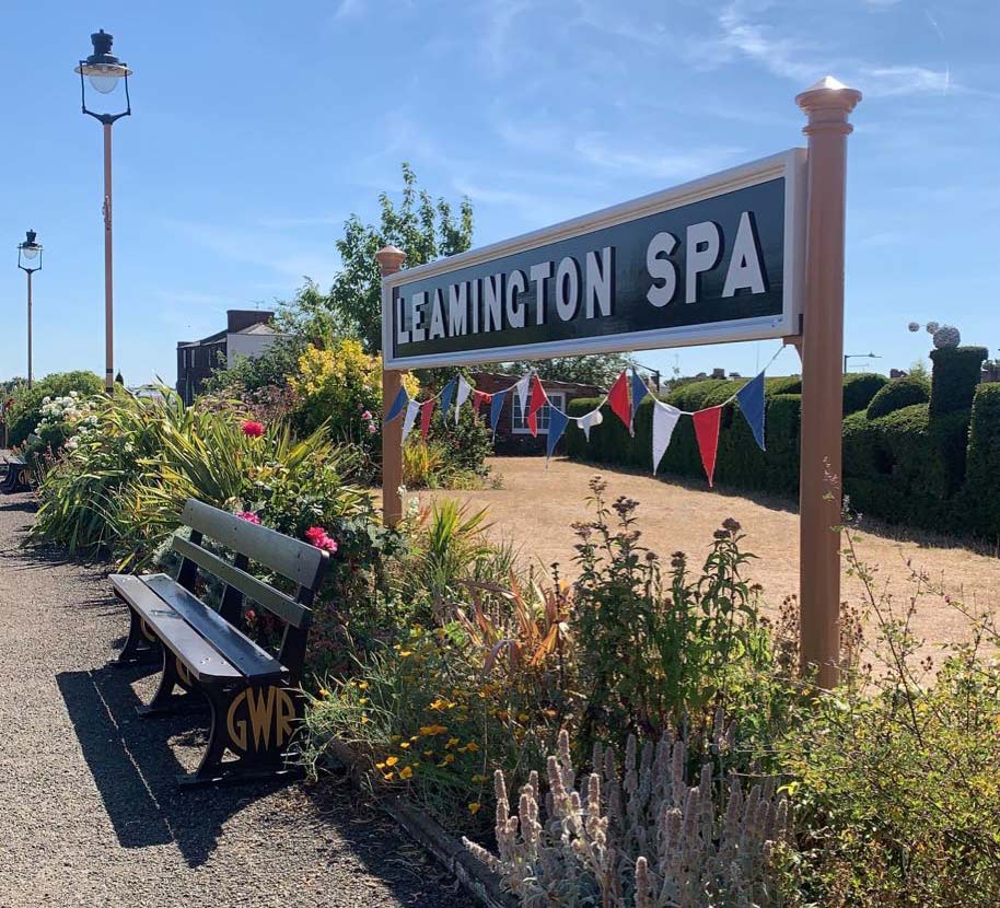 Leamington spa station with flower beds and Jubilee decoration