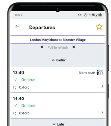 Phone showing live train times with icon indicating between 0-59% seat capacity on trains