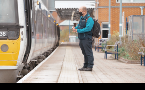 Chiltern train driver using hand sanitiser