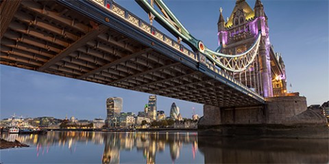 Tower bridge with Skyscrapers in London at sunset